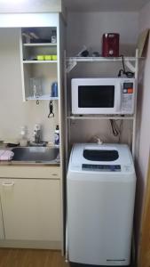 はんこＩＮＮ お城のアパート Hanko INN Private aparments nearby castle tesisinde mutfak veya mini mutfak