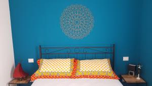 Letto o letti in una camera di Toson d'Oro Bed & Breakfast