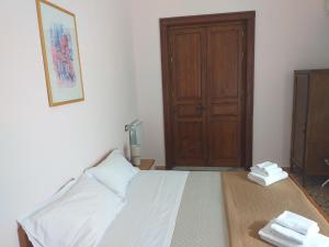 Posteľ alebo postele v izbe v ubytovaní B&B Batarà - "La Terrazza del Centro"