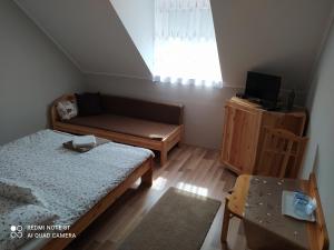 Posteľ alebo postele v izbe v ubytovaní Forrás-G Vendégház