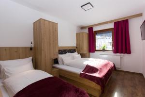 A bed or beds in a room at Reinthalers