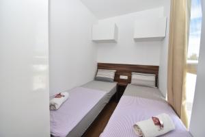 Postel nebo postele na pokoji v ubytování Resort Renjeland + 31 fotografií