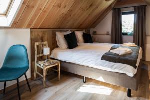 מיטה או מיטות בחדר ב-Bed & Breakfast De Schoppe