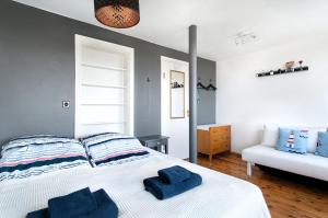 Postelja oz. postelje v sobi nastanitve Grótta Northern Lights - Apartment & Rooms