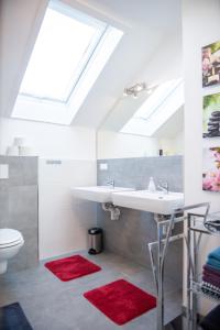 a bathroom with a sink and a mirror at Grimming-Panorama in Niederöblarn