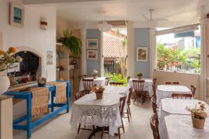 Uma área de estar em Pousada Casablanca
