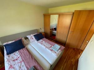 Posteľ alebo postele v izbe v ubytovaní Ferienwohnung am Traunsee