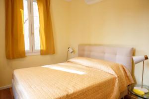 A bed or beds in a room at Meuble' 21 di Anna