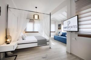 Krevet ili kreveti u jedinici u objektu PORTO PORTES suites