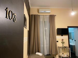 TV a/nebo společenská místnost v ubytování Quintino B&B