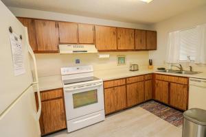 Kuchyň nebo kuchyňský kout v ubytování St Augustine Beach & Tennis Resort 615 + 7 fotografií