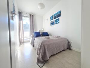 Posteľ alebo postele v izbe v ubytovaní Apartment 1A