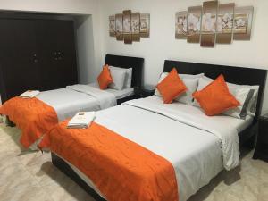 Postel nebo postele na pokoji v ubytování Hotel Fénix Real Bogotá