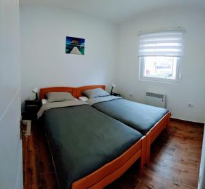Ein Bett oder Betten in einem Zimmer der Unterkunft MK Zlatibor