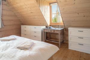 Posteľ alebo postele v izbe v ubytovaní Nydala Rustic