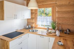 Kuchyňa alebo kuchynka v ubytovaní Nydala Rustic