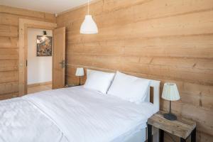 Posteľ alebo postele v izbe v ubytovaní Nydala Rustic