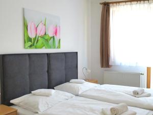 Posteľ alebo postele v izbe v ubytovaní Hotel U Brány
