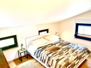 Postel nebo postele na pokoji v ubytování Apartments Pri nas