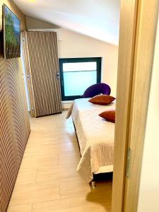 Postel nebo postele na pokoji v ubytování Apartments Pri nas
