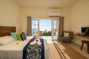 Postel nebo postele na pokoji v ubytování Villa Panoramic Seaview + 37 fotografií
