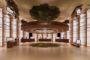 a large hall with a large chandelier and a large room at PARKROYAL COLLECTION Marina Bay, Singapore in Singapore +37 photos