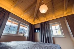 Postel nebo postele na pokoji v ubytování Chalet Arena