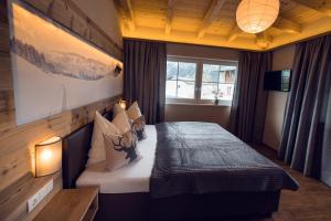 Postel nebo postele na pokoji v ubytování Chalet Arena