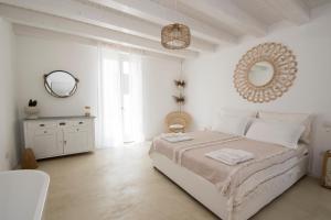 A bed or beds in a room at Casa Memi