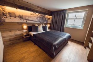 Postel nebo postele na pokoji v ubytování Chalet Arena