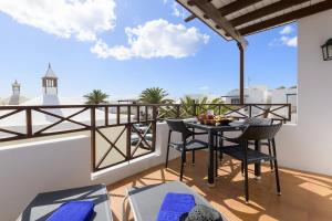 En balkon eller terrasse på Casa Marta