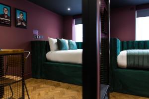 Katil atau katil-katil dalam bilik di Duke Street Boutique Hotel