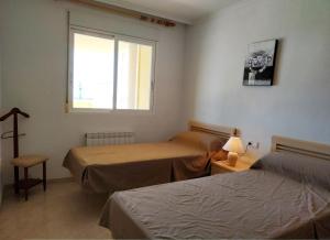 Posteľ alebo postele v izbe v ubytovaní Residencial Nerea Orangecosta + 13 fotografií