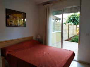 Posteľ alebo postele v izbe v ubytovaní Residencial Nerea Orangecosta