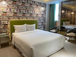 Letto o letti in una camera di 浪琴Motel文創旅館