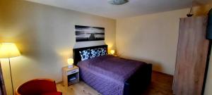 Łóżko lub łóżka w pokoju w obiekcie Pool Apartments