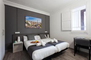 מיטה או מיטות בחדר ב-AB Marina Apartments