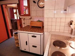 a toy kitchen with a sink and a toilet at Brunners harzerhof in Iseltwald