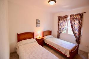 Posteľ alebo postele v izbe v ubytovaní Campo Olivar PM + 9 fotografií