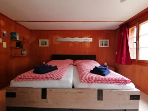 Tempat tidur dalam kamar di Brunners harzerhof