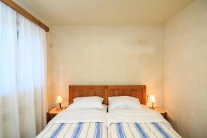 Postel nebo postele na pokoji v ubytování Holiday Home Mikula