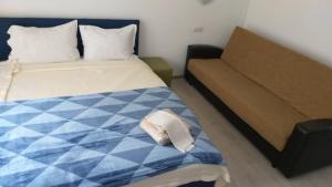 Postel nebo postele na pokoji v ubytování Sofial Guesthouse