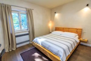 Postel nebo postele na pokoji v ubytování Holiday Home Mikula