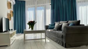Posezení v ubytování Apartament Krzysztofa Bochusa