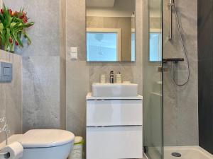 Koupelna v ubytování Apartament Krzysztofa Bochusa