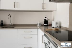 Küche/Küchenzeile in der Unterkunft YourHouse Es Niu, apartment in Puerto de Sóller