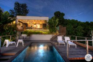 Bazén v ubytování Villa Paloma 4 étoiles avec Piscine et Vue exceptionnelle sur l'ocean à Saint-Leu nebo v jeho okolí