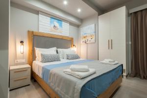 Кровать или кровати в номере Armonia Rooms