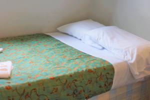 Postel nebo postele na pokoji v ubytování Plaza Hotel