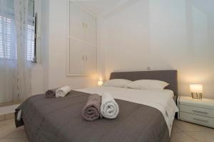 Postel nebo postele na pokoji v ubytování Apartment N central